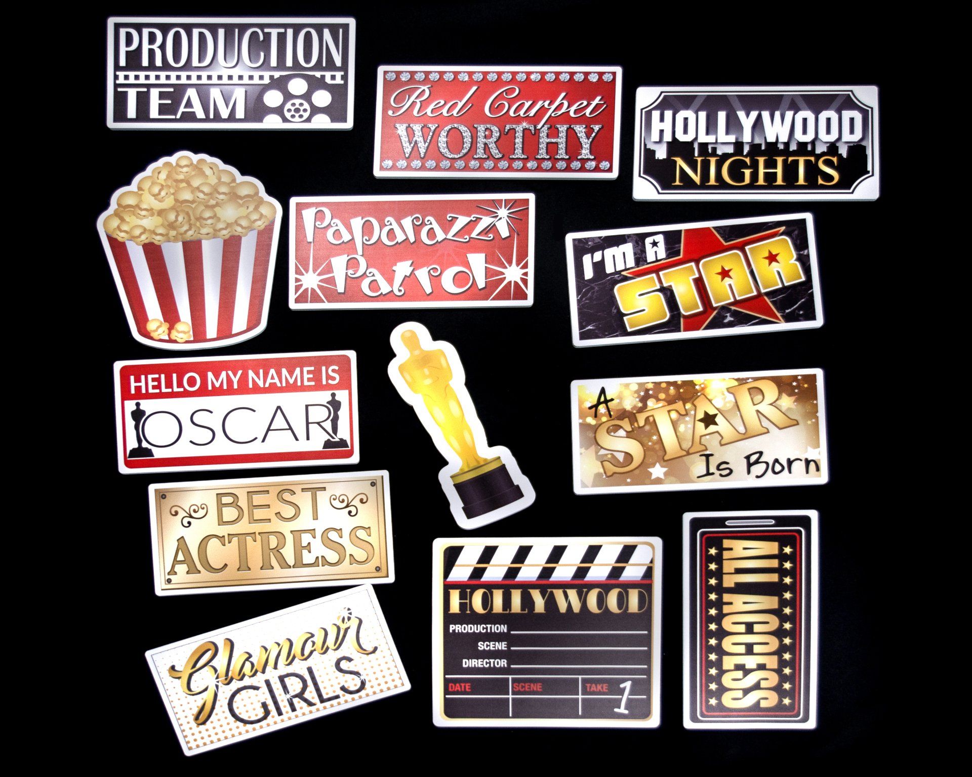 Hollywood themed embellishments: popcorn, award, clapboard, signs with phrases like 
