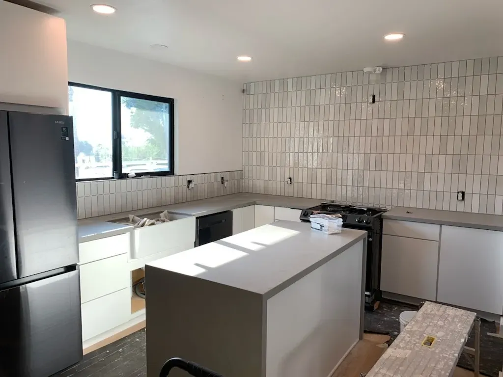 Modern kitchen remodel with new cabinets by Kearney Restorations in Yucaipa