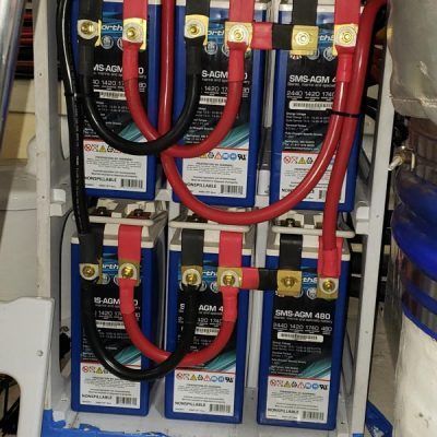 A bunch of batteries are stacked on top of each other