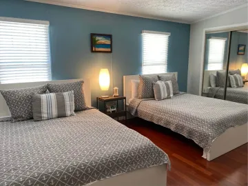 Happy Florida Keys customer reviewing Maid in Paradise cleaning services
