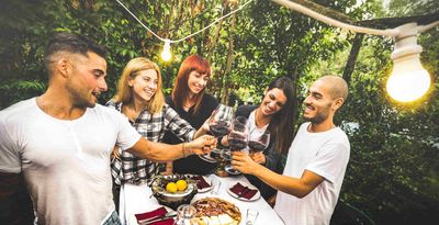 Friends enjoying outdoor meal in Joliet