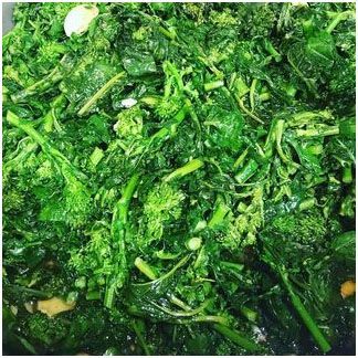 A close up of sauteed broccoli rabe
