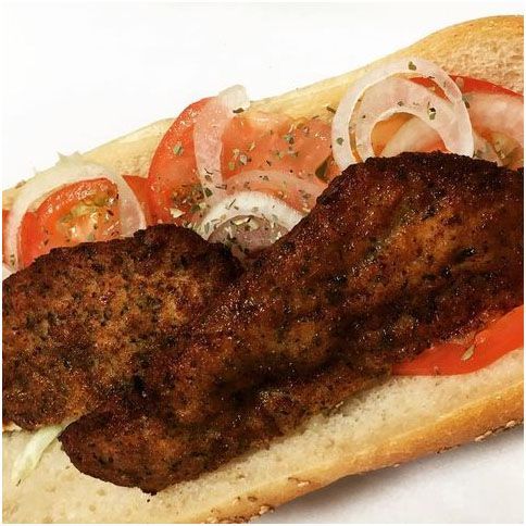 A chicken cutlet hoagie on a bun