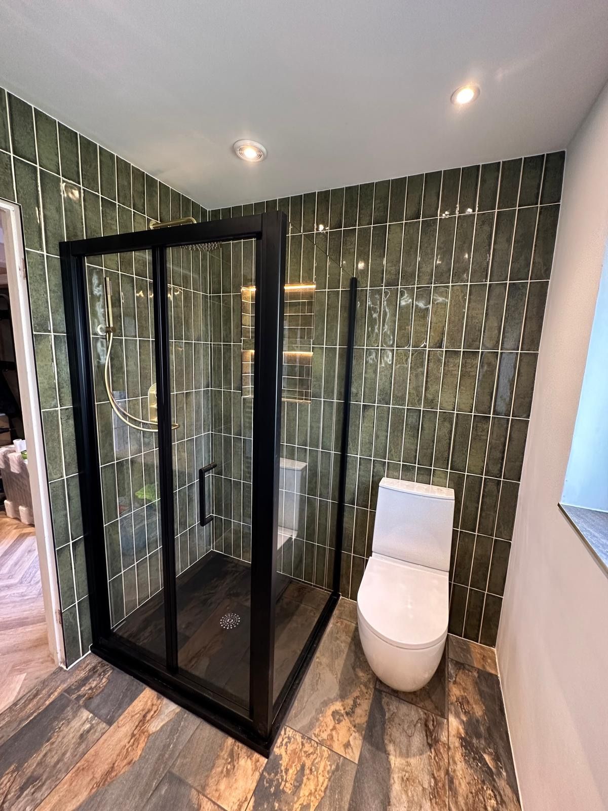 A kitchen with stainless steel appliances and granite counter tops