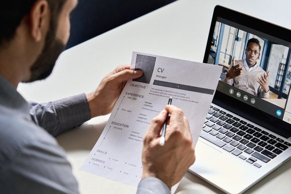 lady holding a laptop