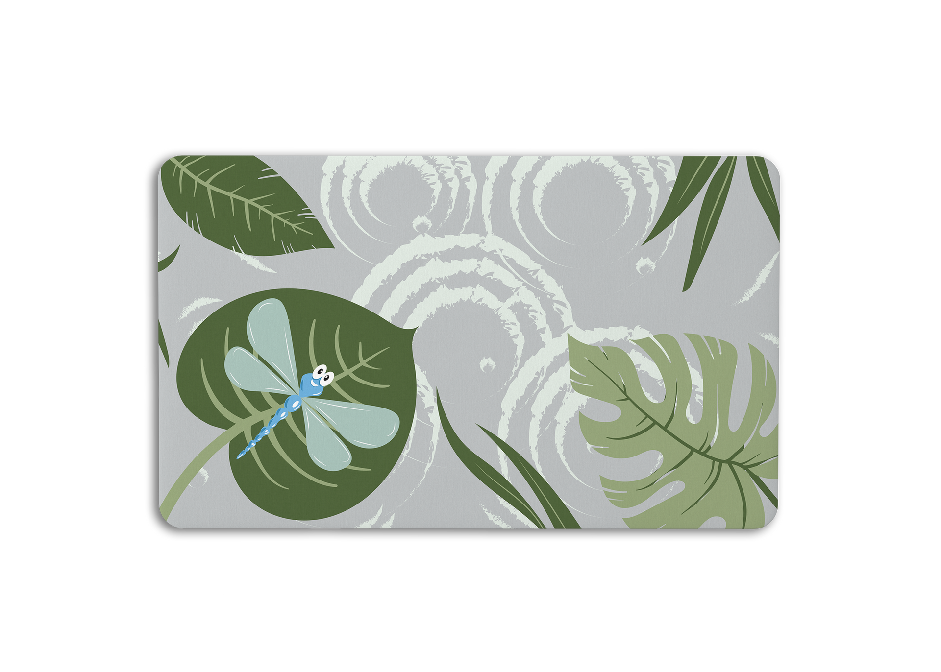 A gray rectangular mat featuring green tropical leaves, ripple patterns, and a light blue dragonfly on a large leaf.
