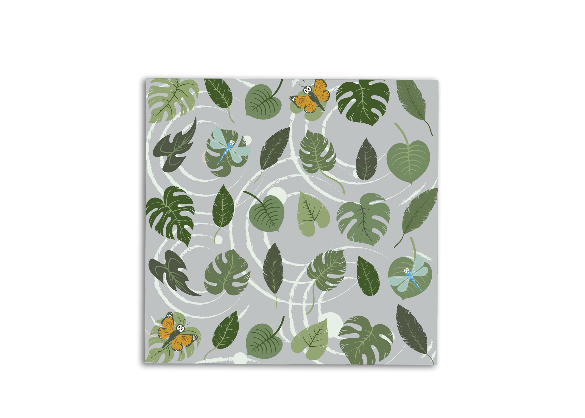 A square patterned fabric featuring various green tropical leaves and two small orange butterflies on a light gray background.