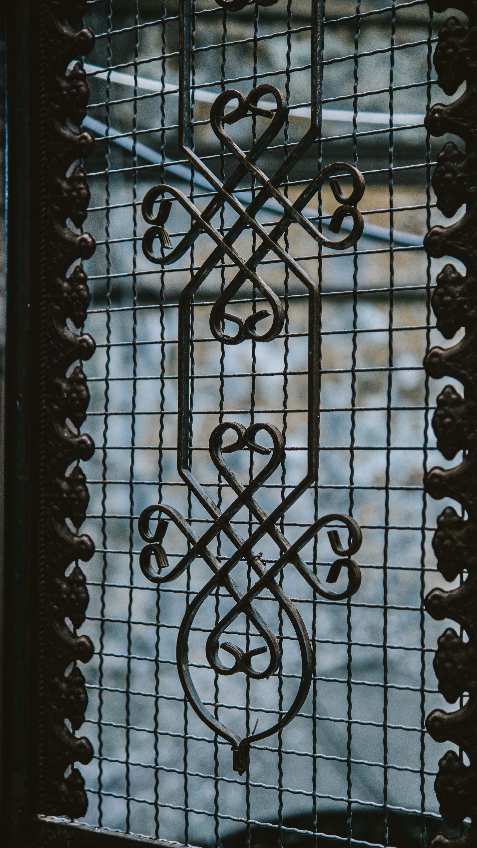 Wrought iron gate with decorative scrollwork ready for powder coating