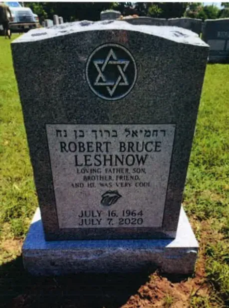Gravestone with Star of David and inscription for Robert Bruce Leshnow in a cemetery