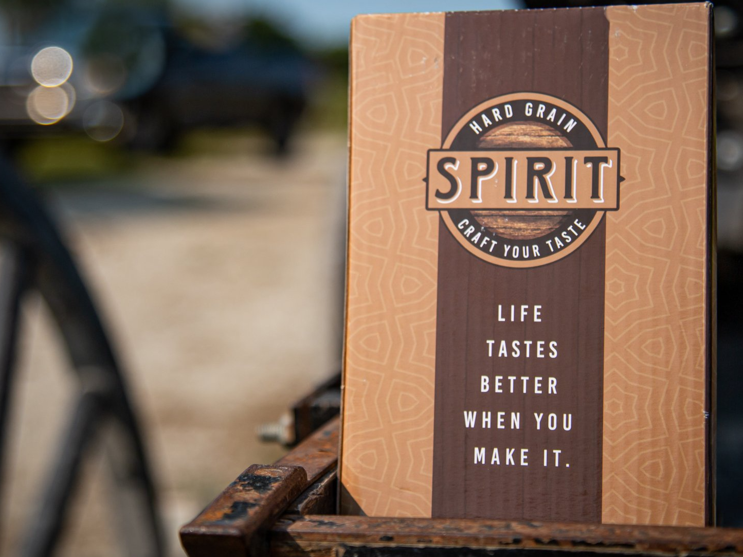 A cardboard box that says spirit life tastes better when you make it