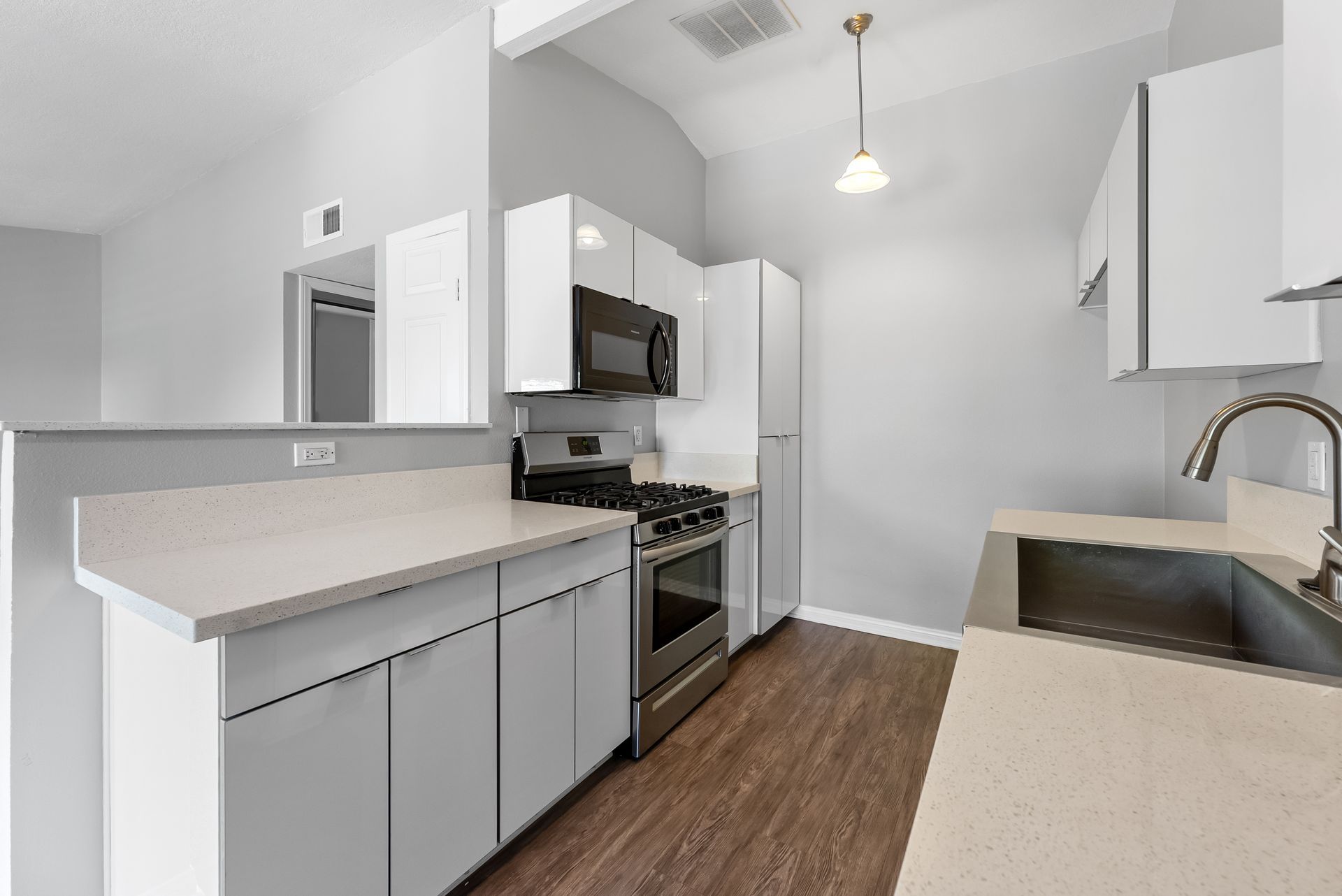 kitchen with stove and microwave