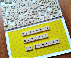Scrabble tiles spelling