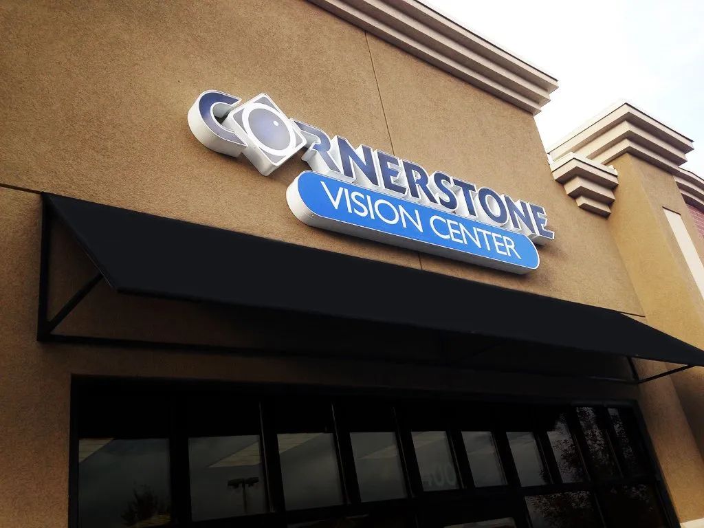 Stone Vision Center sign above a tan building entrance