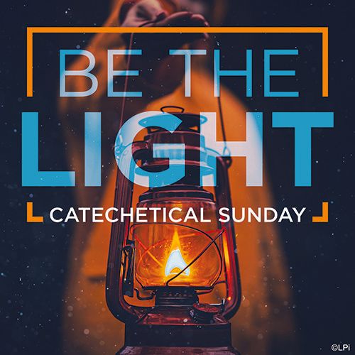 A person is holding a lantern with the words 