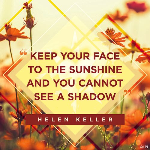 A a graphic of flowers with a quote by Helen Keller.