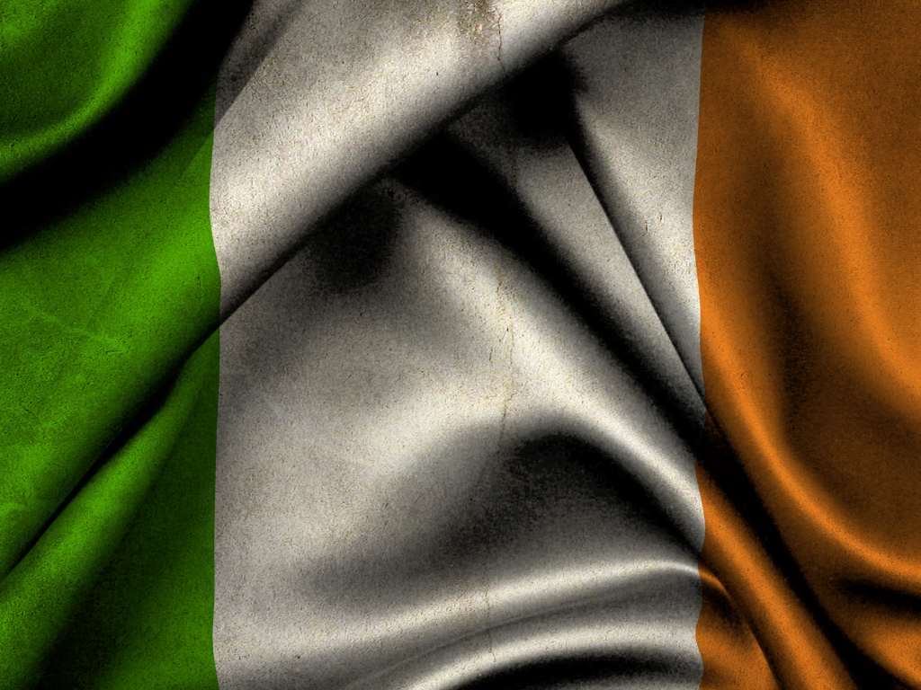 Green, white, and orange fabric with soft folds, resembling the Irish flag.