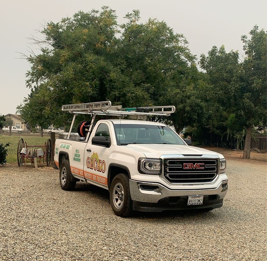 Pest Control Worker Spraying Insecticide - Merced, CA - Gecko Pest & Landscape Management Pest Control Worker Spraying Insecticide - Merced, CA - Gecko Pest & Landscape Management