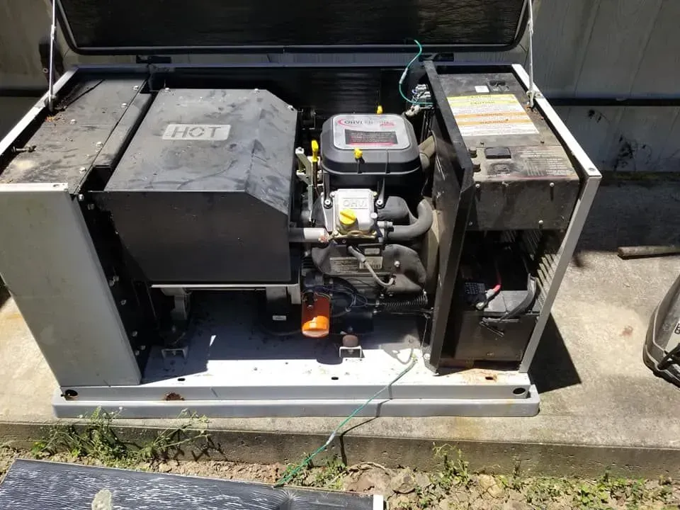 Generator with open panels showing the engine and electrical components.