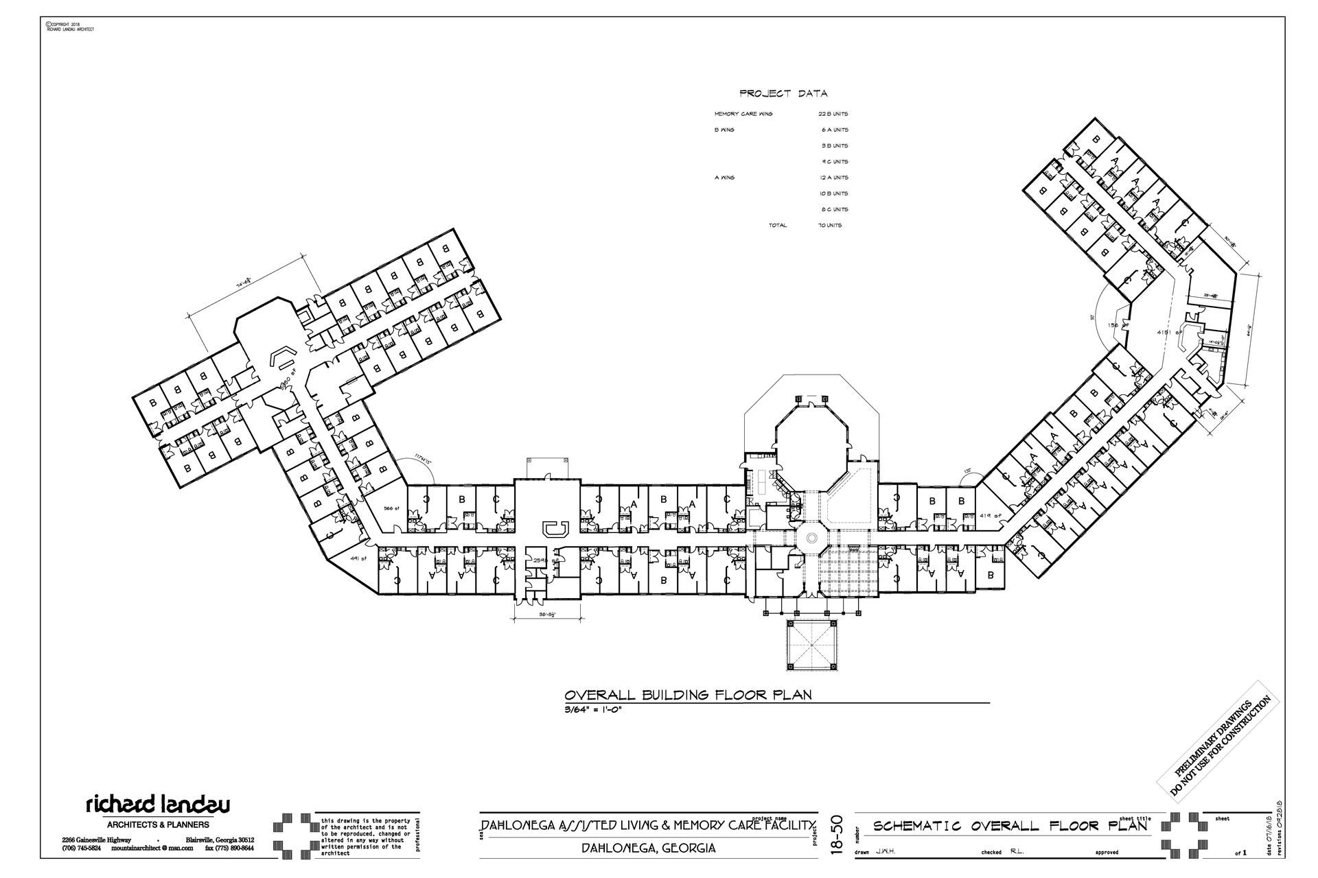 Black-and-white site plan showing a U-shaped building layout with labeled rooms and surrounding pathways