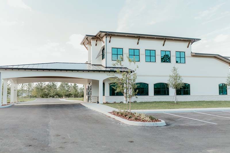 Side exterior view of Kind Animal Care veterinary clinic building