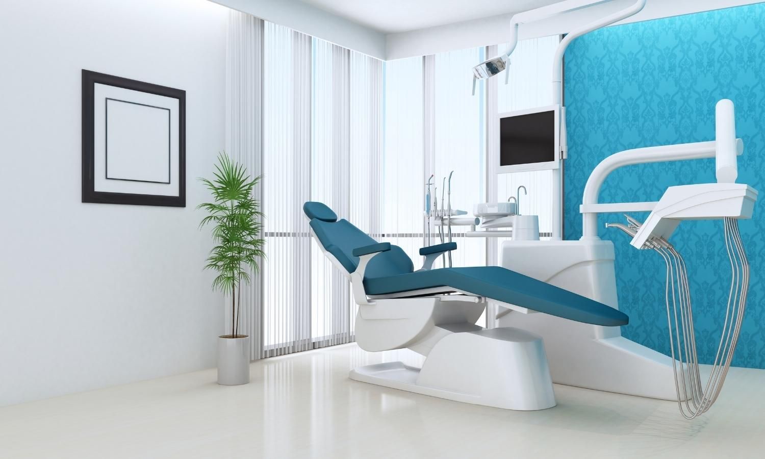 Modern dental treatment room with blue chair, sink, wall-mounted screen, and bright white interior