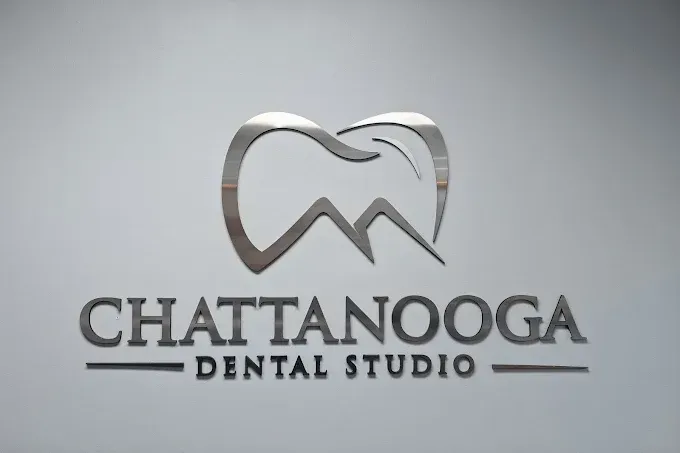 Chattanooga Dental Studio logo with stylized tooth icon on a light gray background