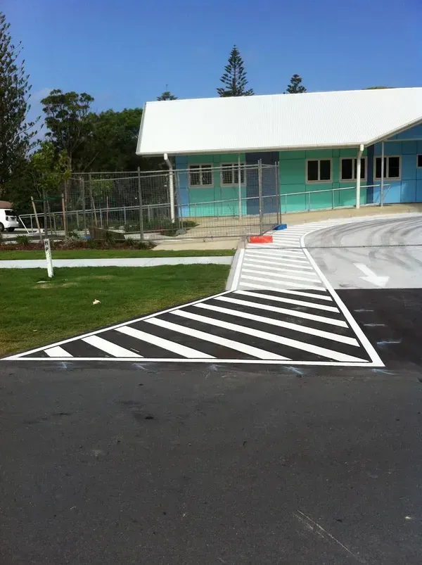 A Blue Building With a Handicapped Ramp in Front of It — North Coast Line Marking in Ipswich, NSW