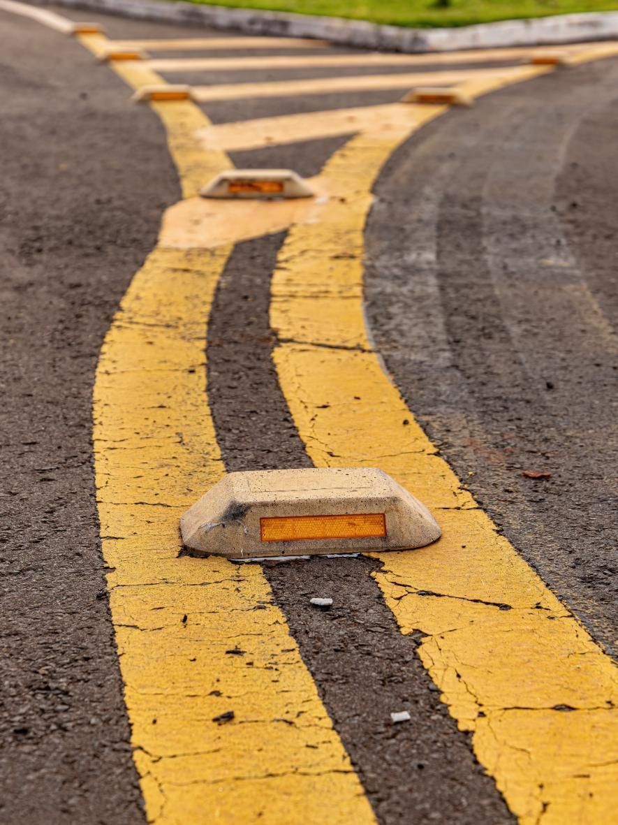A Close Up of a Yellow Line on a Road — North Coast Line Marking in Talofa, NSW