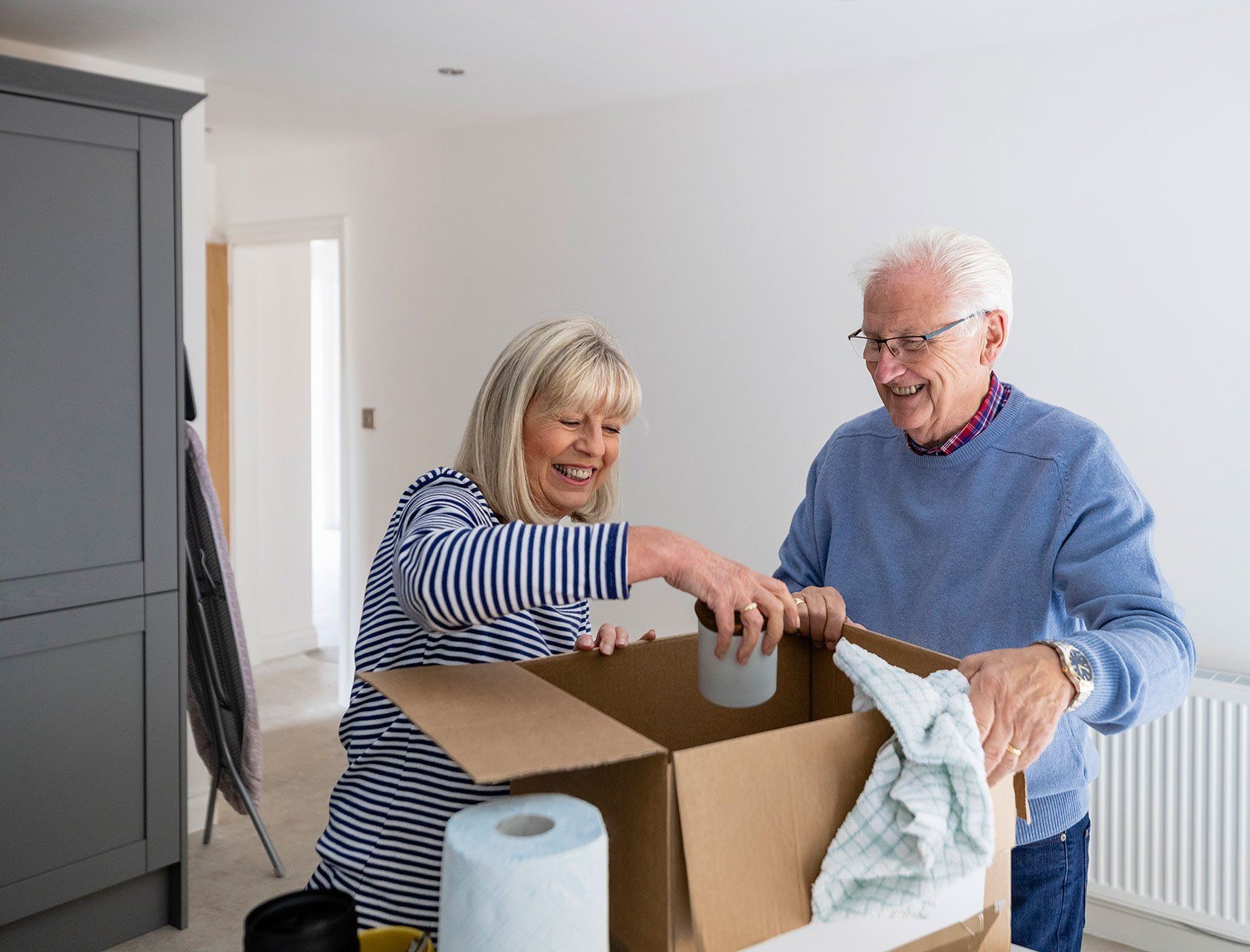 Senior Couple Moving to a New Home — Wauwatosa, WI — Best Estate Services Senior Couple Moving to a New Home — Wauwatosa, WI — Best Estate Services