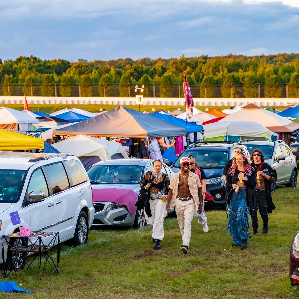  A car navigating into a designated festival parking area in Sydney
