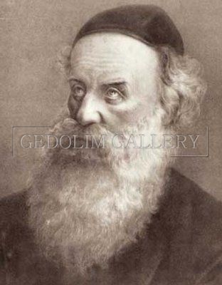 A black and white photo of a man with a beard and a hat.