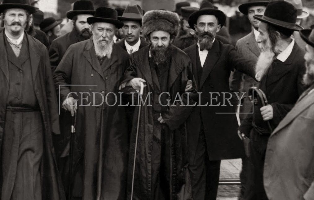 A black and white photo of a group of men standing next to each other.