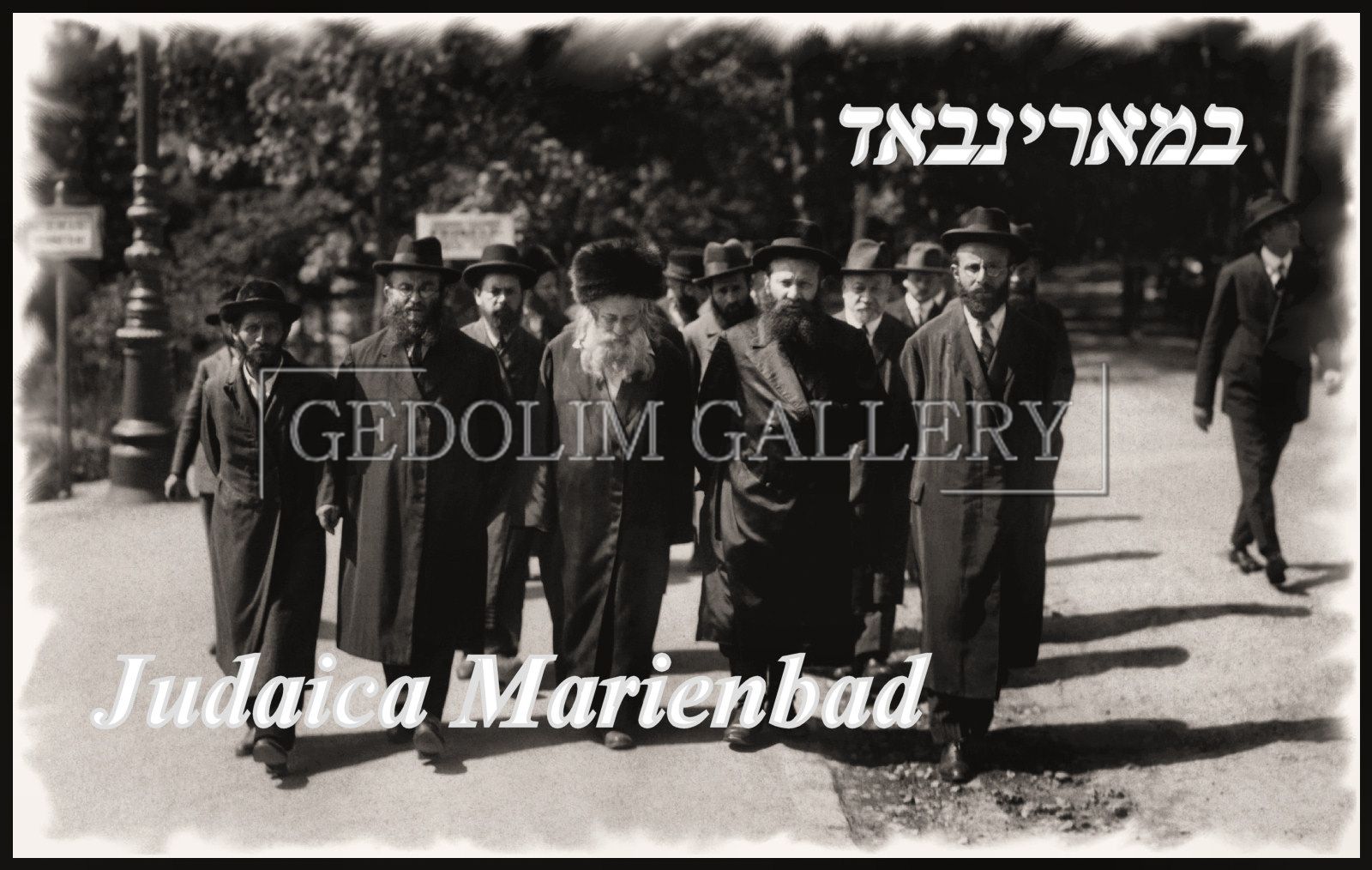 A group of men are standing in front of a sign that says gedolin gallery