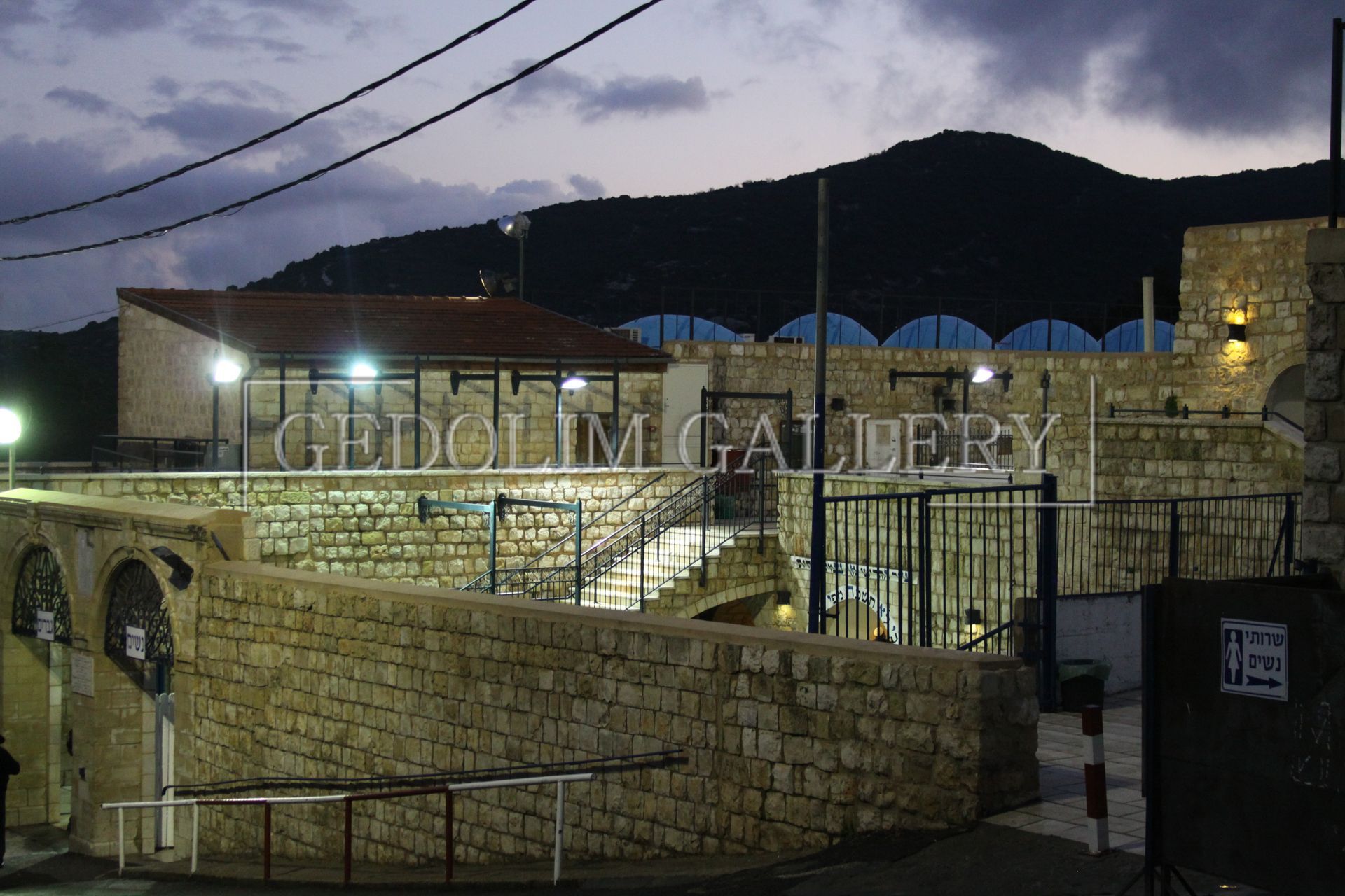 A stone building with the word gallery on it
