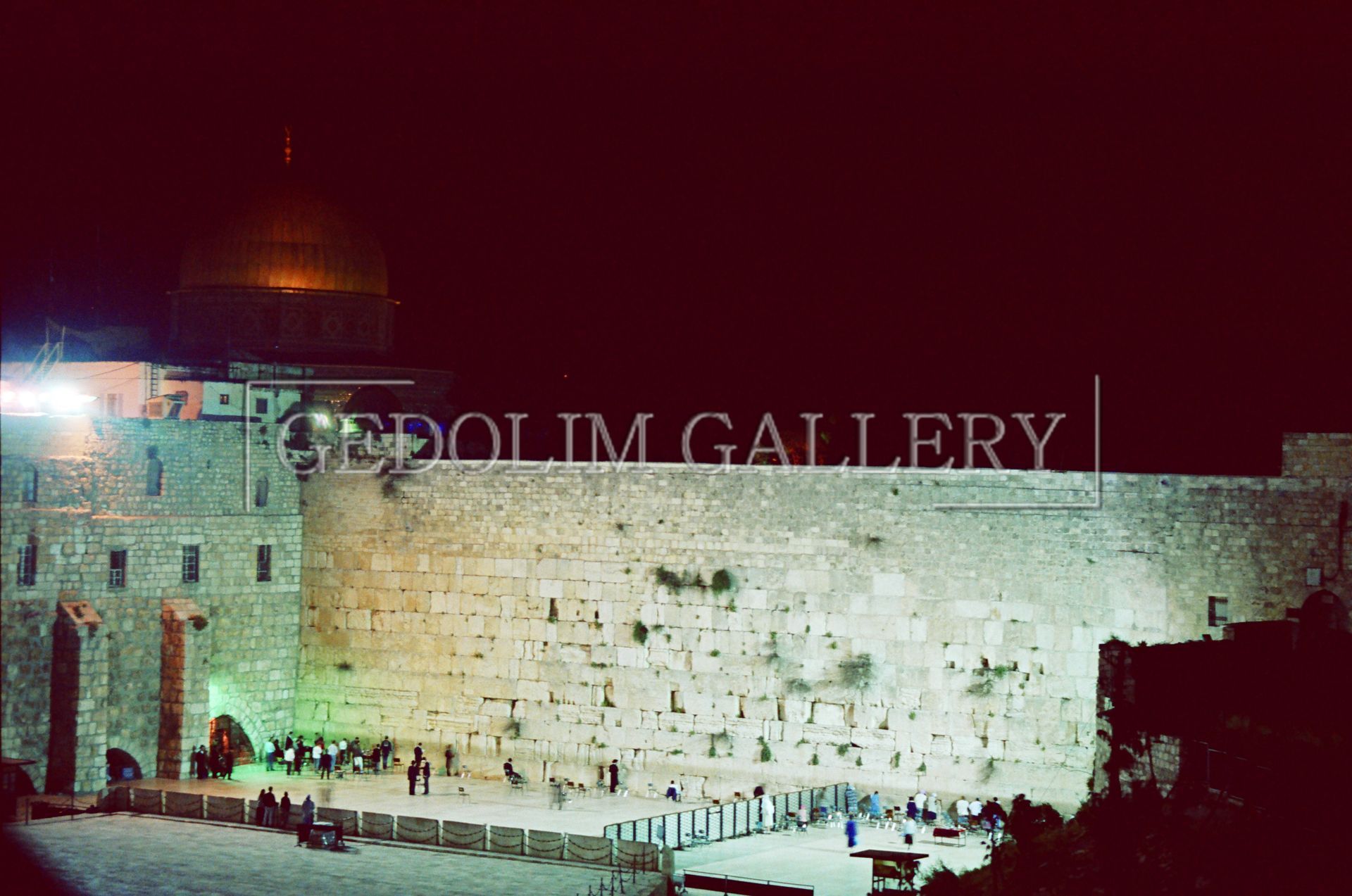 A picture of the wailing wall at night taken by the dolim gallery