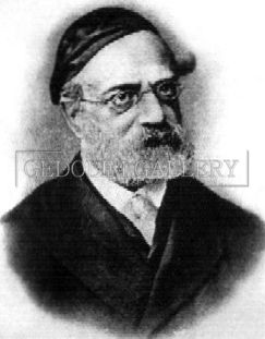 A black and white photo of a man with glasses and a beard