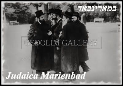 A group of men are standing next to each other in a black and white photo.