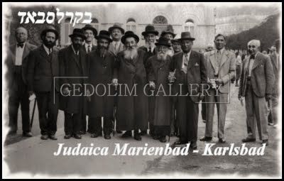 A group of men are posing for a picture in a black and white photo.