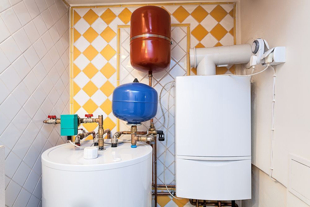 There Is A Boiler And A Water Heater In The Room — Macleay Air In Macksville, NSW