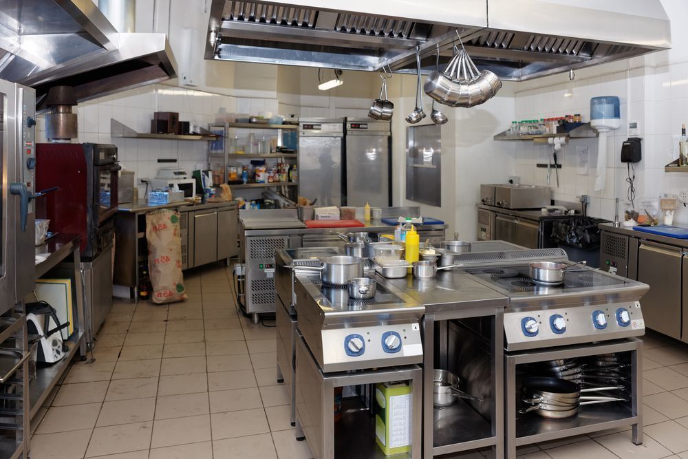A Large Commercial Kitchen With Lots Of Stainless Steel Appliances — Macleay Air In West Kempsey, NSW