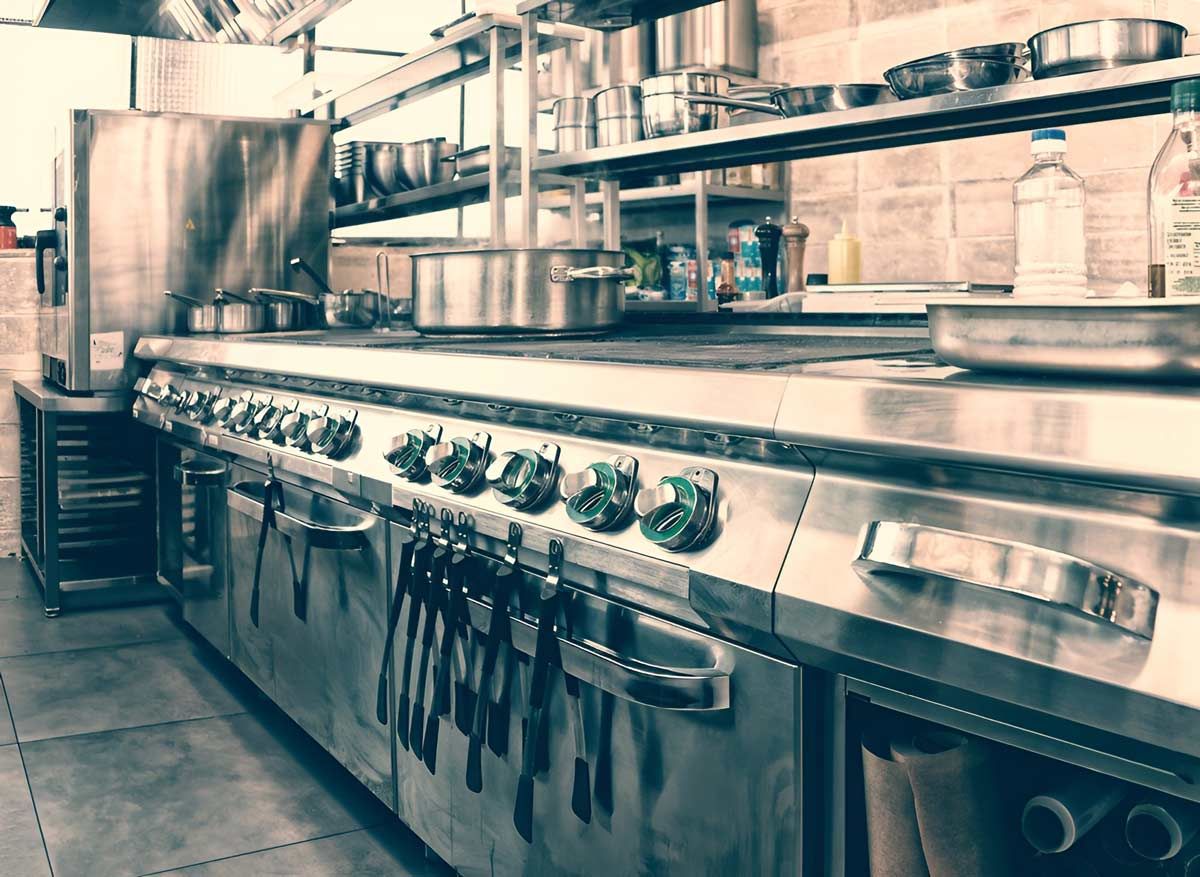 Professional Kitchen Interior, Crock On Stove — Macleay Air In South West Rocks, NSW