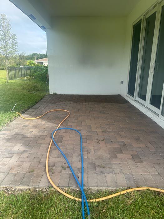 Before image of a dirty patio