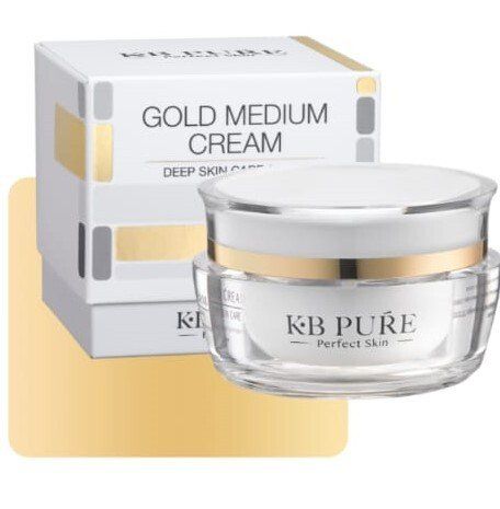 A jar of kb pure gold medium cream next to a box