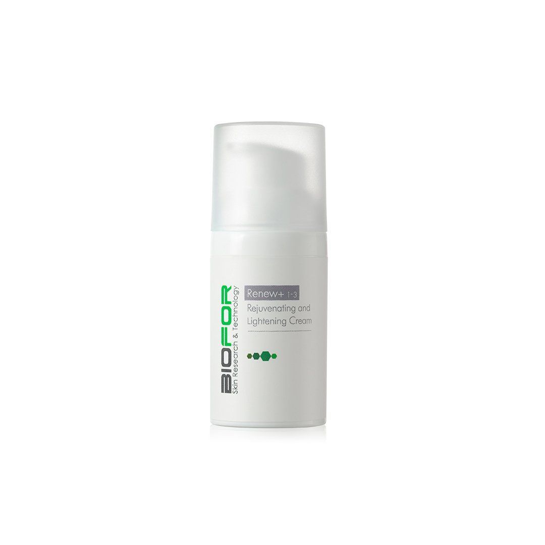 A white bottle of lotion with a green label on a white background.