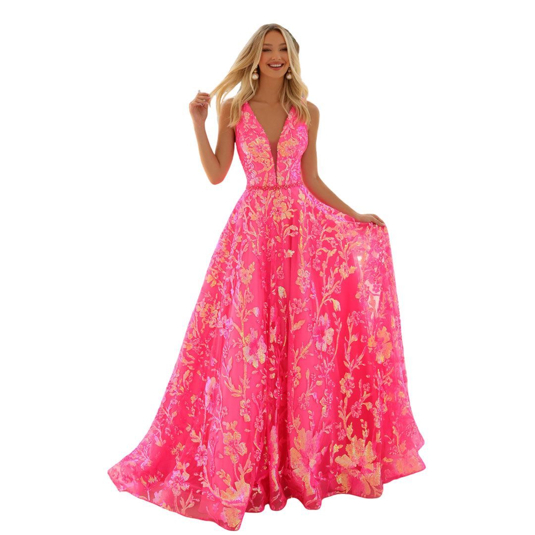 Woman modeling a bright pink floral maxi dress with a flowing skirt on a white background