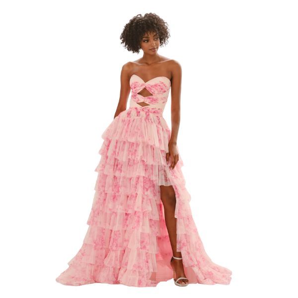 Model wearing a strapless champagne ball gown with a full skirt against a white background