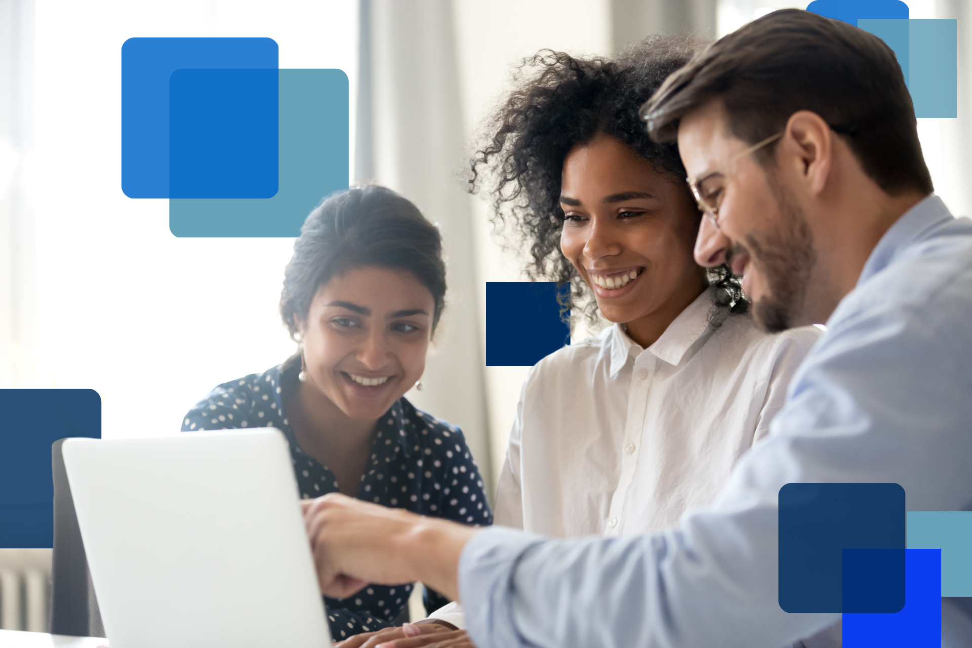 image of business team looking at laptop