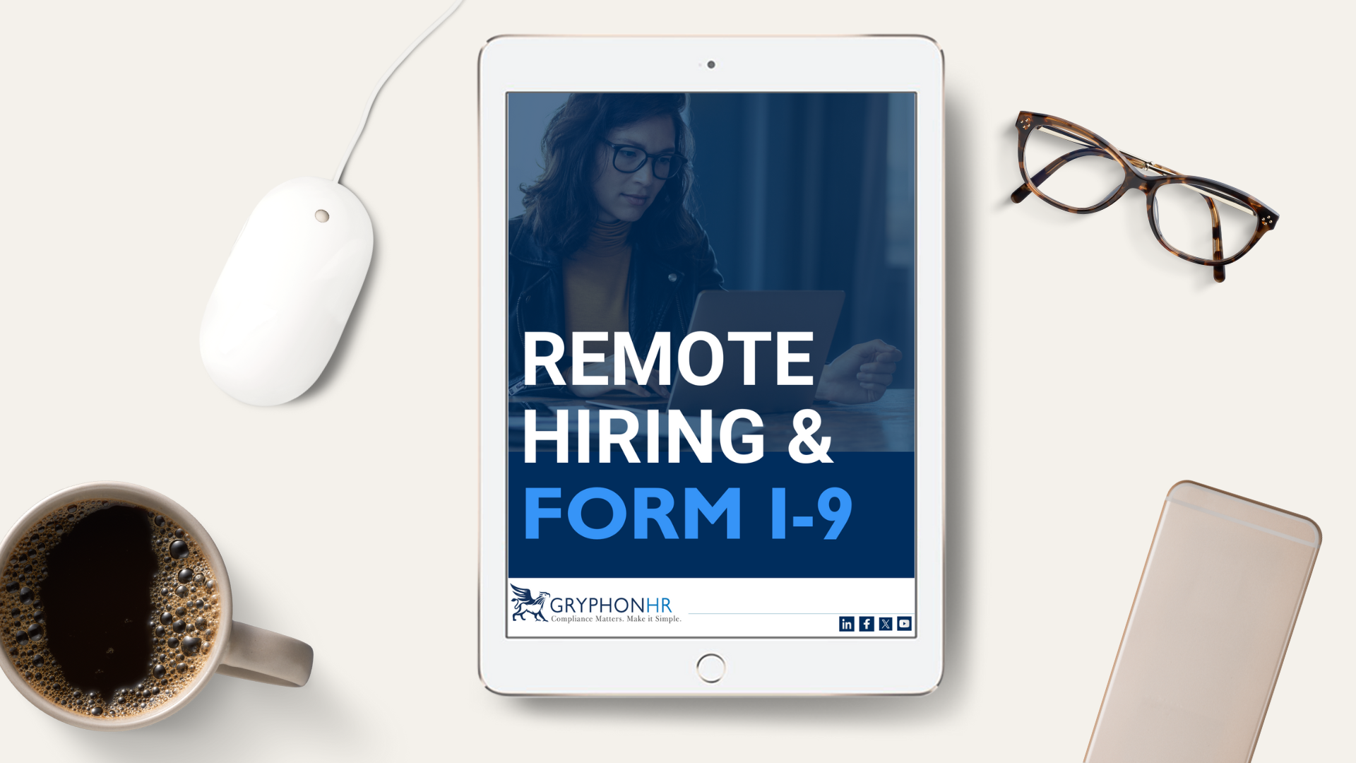 tablet with remote I-9 white paper on desk