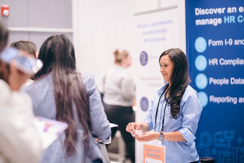 Person standing at ASA law conference booth