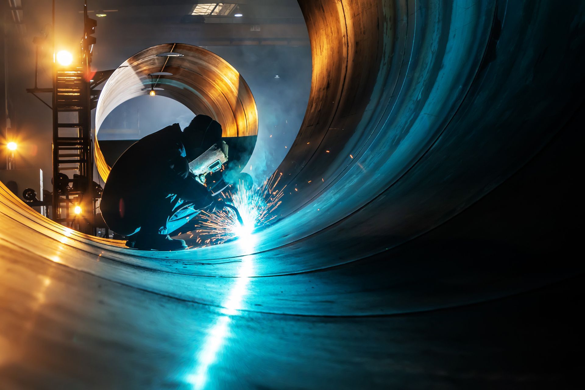 Welder Working At Construction — Wisconsin Rapids, WI — BDT INC Welder Working At Construction — Wisconsin Rapids, WI — BDT INC